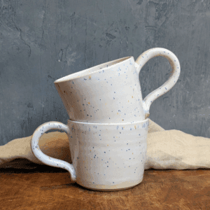 Pair of Brightly Speckled Mugs with Hot Chocolate